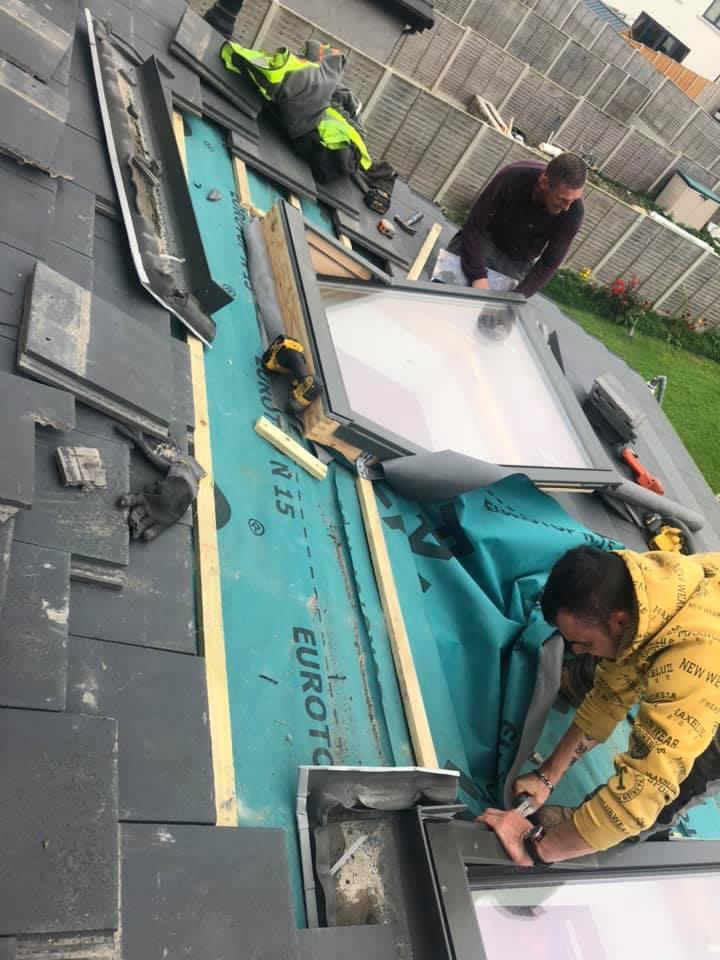 Roofers doing emergency roof repairs in Manchester